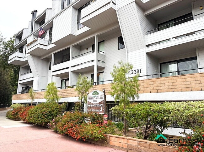 Building Photo - Spacious 2-Bedroom Upper-Level Condo in Pr... Unit # 334