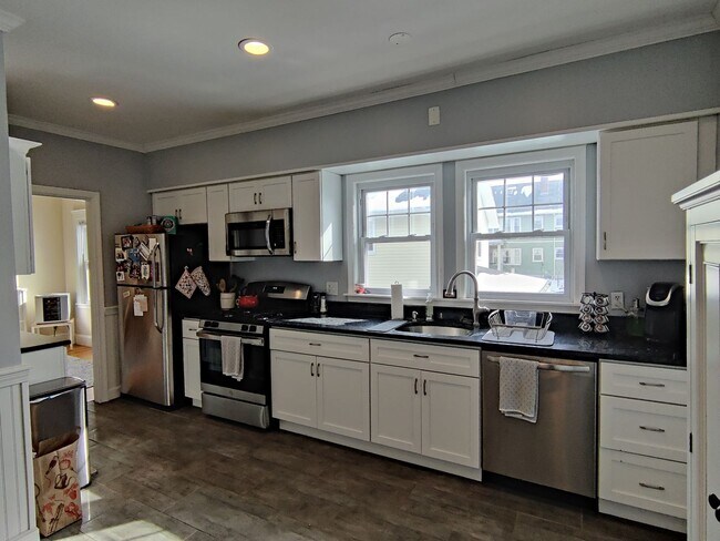 Photo - Large Fully Renovated Unit in Oak Sq. Free Laundry, Backyard, Patio, Parking Included