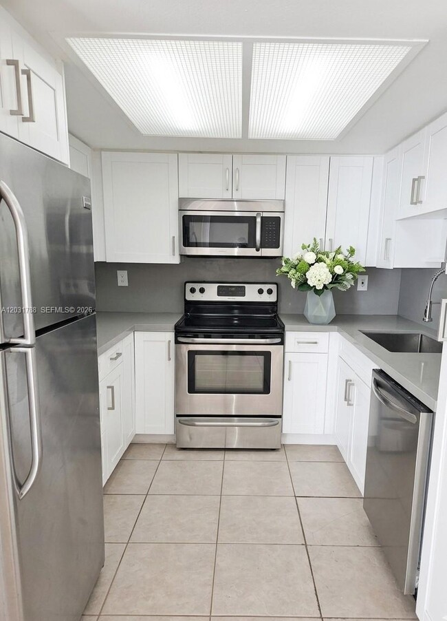 Building Photo - 9070 SW 125th Ave Unit A104
