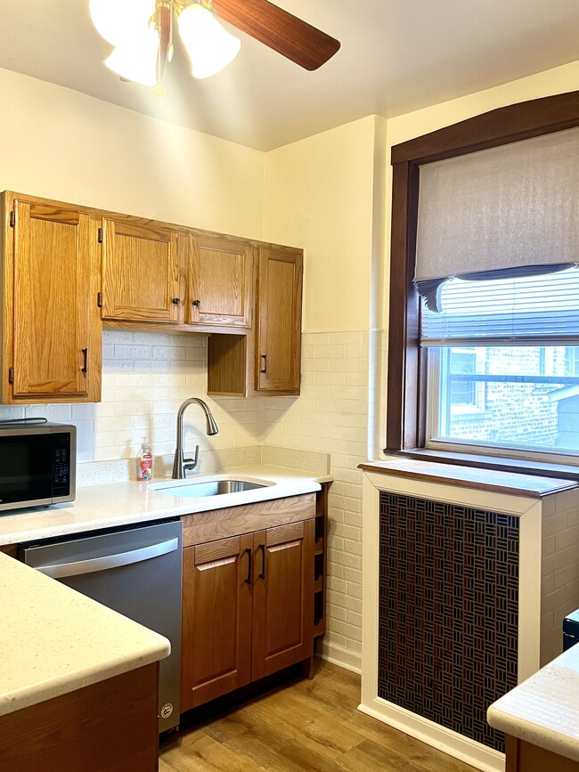Kitchen with Dish Washer - 3941 N Christiana Ave Unit 1