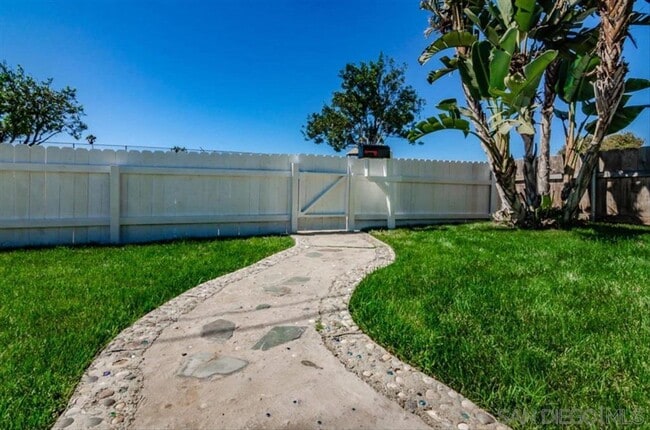 Photo - Remodeled 3 bedroom 2 bath.  Fenced yard. Outdoor shower, deck ,attached garage. Near beaches.