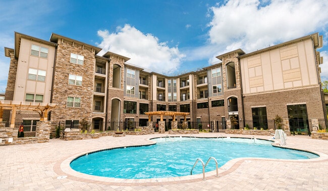 Enjoy premier amenities like a resort style pool - Brizo Apartments