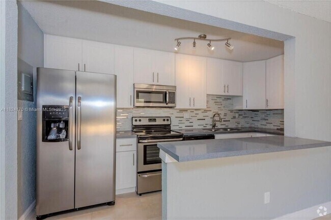 Building Photo - 4640 NW 79th Ave Unit 1C Rental