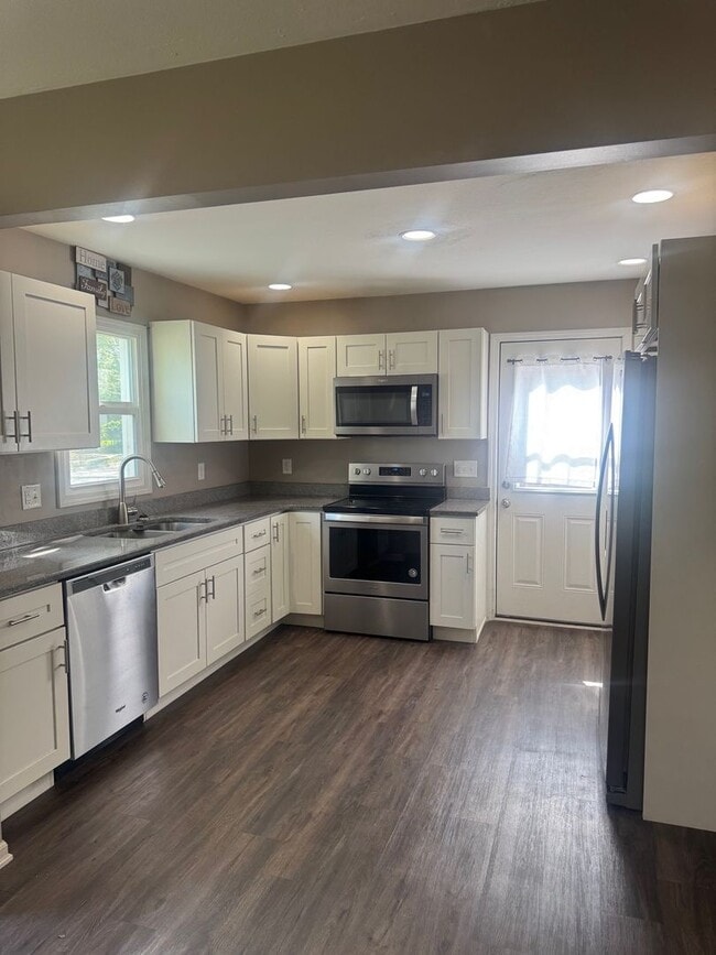Photo - Charming Updated 3BR Home with Large Fenced Yard & Garage