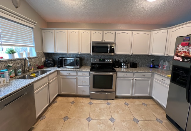 Photo - Beautifully Remodeled 5-Bedroom Home with Finished Basement and Custom Upgrades!