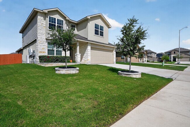 Photo - Spacious 5BR Home with Game Room, First-Floor Primary Suite & Appliances Included