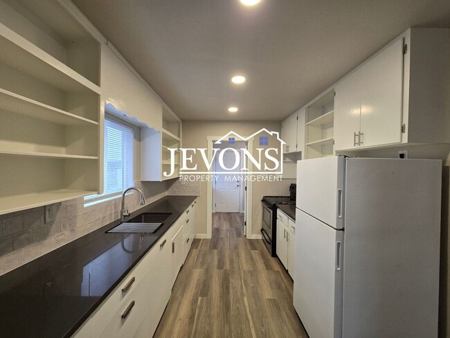 Photo - 3 bedroom home with washer and dryer – 1-acre lot next to an orchard – Large and small pets allowed!