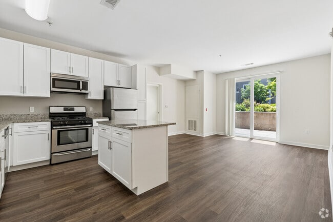 2BR, 2BA - 1,106SF - Kitchen and Living Room