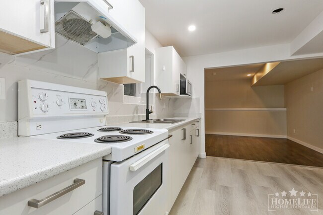 Photo - Rare 2 Bedroom Suite  in Great  Sardis Loc... Unit Basement