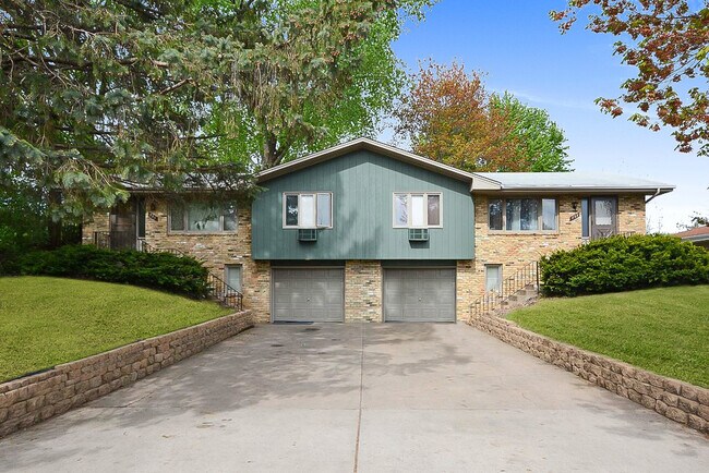 Fantastic location with an attached garage and a huge, private backyard. - 720 Silver Lake Road NW