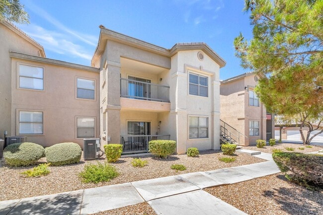Building Photo - Top-Floor End Unit with Dual Primary Suites in a Gated Southwest Community!