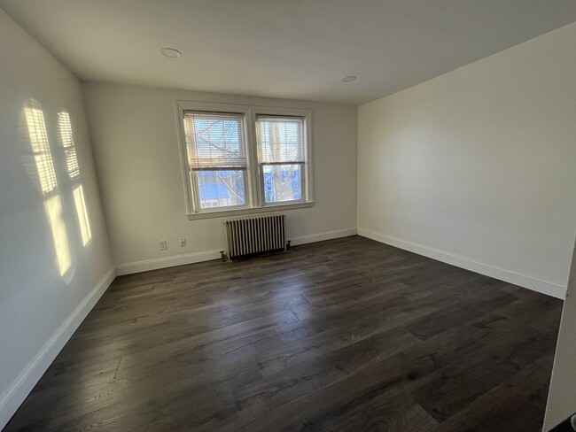 Bedroom 1 with full size closet - 170 Hendrick St Apartments Unit 2nd floor