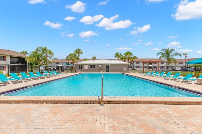 Sparkling Swimming Pool with Chaise Lounges