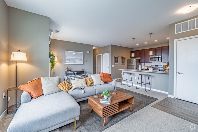 2 habitaciones, 2 baños - 1014 pies cuadrados - Sala de estar - Liberty Flats