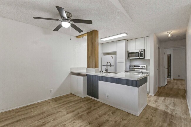 Photo - Luxury Living: 2-Bed Condo with 2 Parking Spots & Full Amenities!