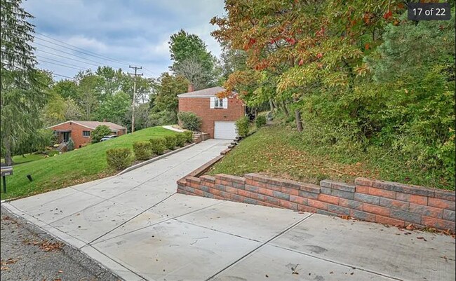 New concrete and retaining wall - 726 Orchard Hill Dr House