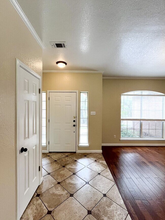 Photo - Available NOW!!!! This beautiful 2 story, 4 bedroom, 2 bath, two car garage with garage door open...