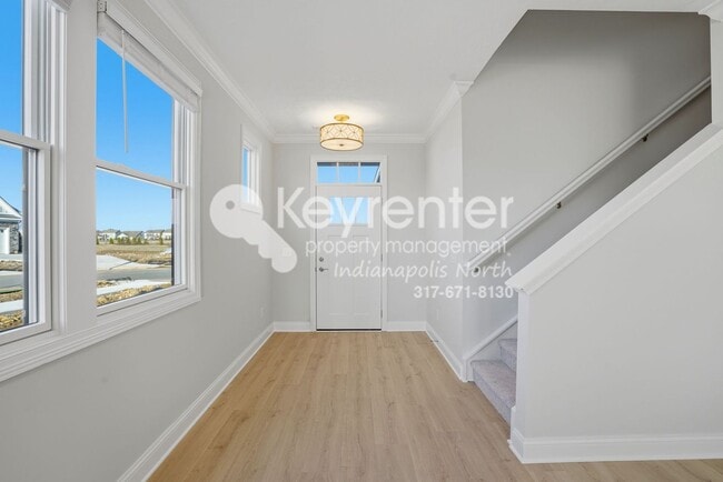 Photo - Located in Westfield, IN, this attractive 3-bedroom, 2.5-bath home sits on a corner lot within an...