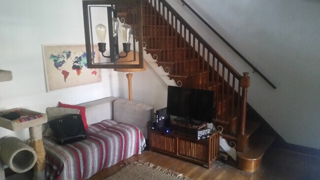 Living room facing stairs