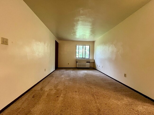 Photo - Second Floor One Bedroom Apartment! Built-In A/C, Off-Street Parking & More! Call Today! Unit 101