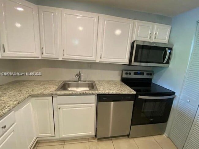 Building Photo - 7831 Colony Cir N Unit 108 Rental