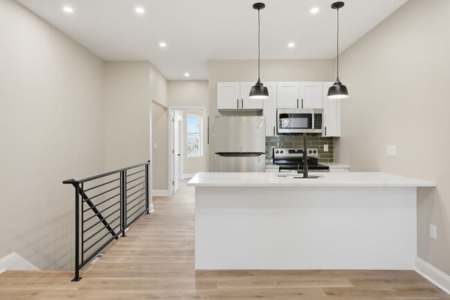 Building Photo - 6028 Osage Ave Unit 2