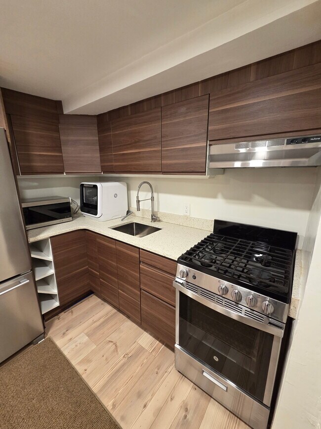 Updated Kitchen with Full Stove and Oven - 482 Columbus Ave Unit Garden