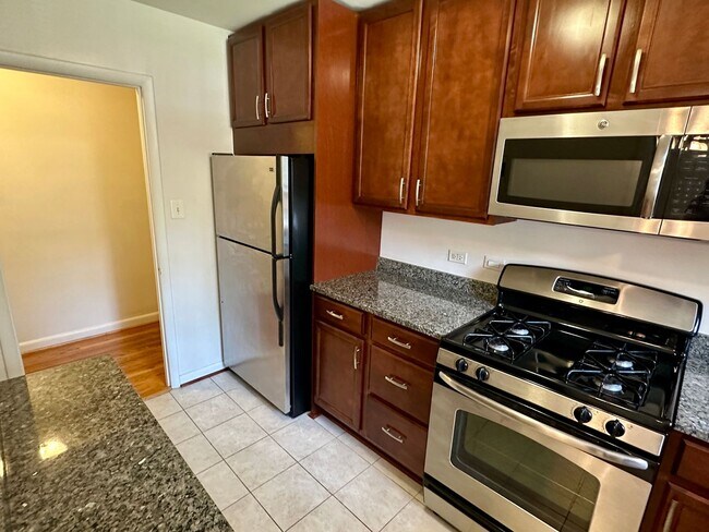 Photo - Light filled one-bedroom condo located in ... Unit M-201,