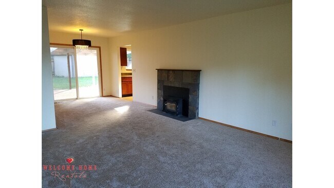 Photo - Beautiful Remodeled Rambler!!!  Come enjoy this HUGE backyard!!  NEW CARPET!!