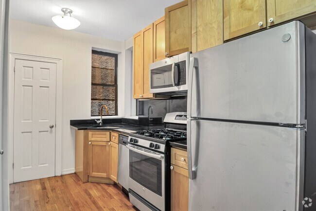 Building Photo - 358 W 45th St Unit 2-C Rental