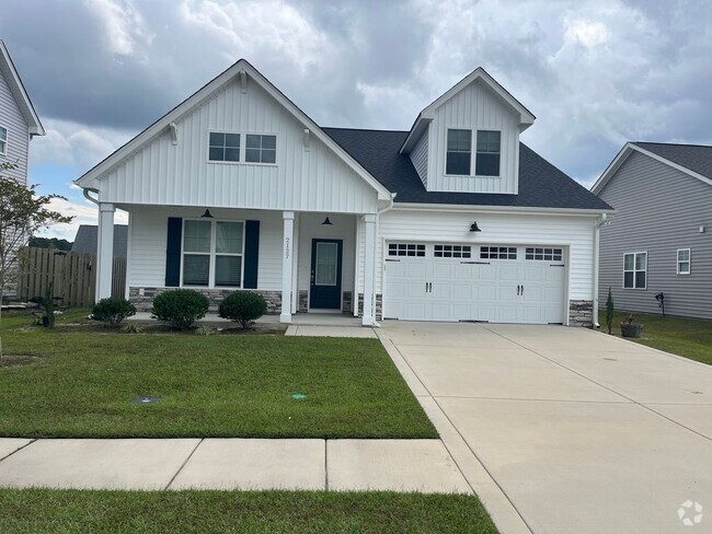 Building Photo - Pet Friendly with fenced in backyard Rental