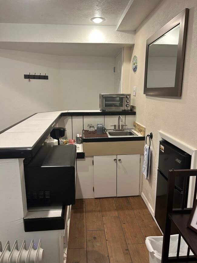 Photo - 10933 W 67th Pl Unidad Cozy Basement Suite