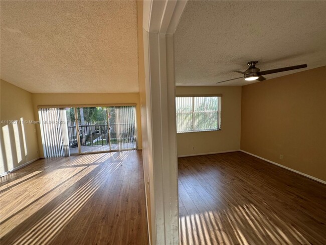 Building Photo - 8801 Wiles Rd Unit 303 Rental