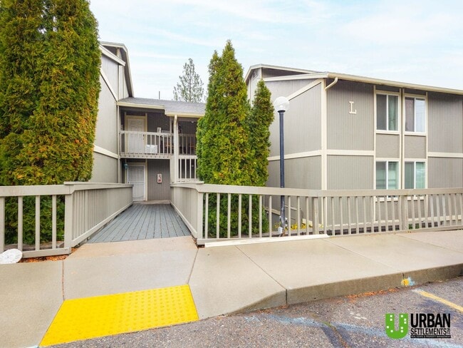 Building Photo - Comfortable 1-Bedroom Condo with Parking & Resort-Style Amenities