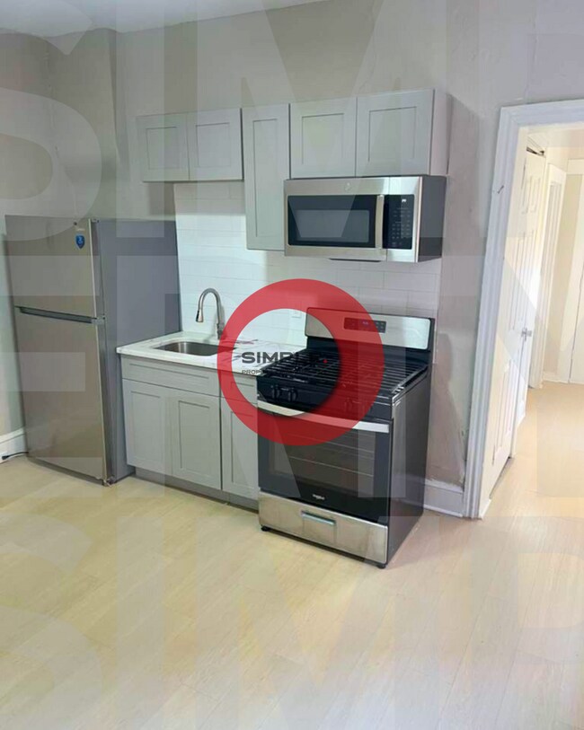 Building Photo - Multi-family building with huge yard Unit Apartment 1