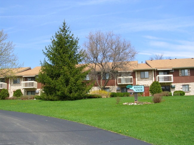 Building Photo - 13640 W Cleveland Ave Unit 7