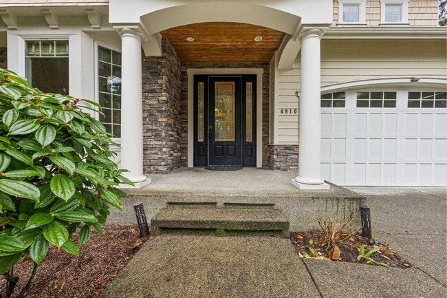 Photo - Elegant University Place Home with A/C, Tandem Garage, Office & Balcony Bedroom Near JBLM!