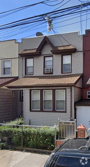 Building Photo - 97-44 81st St Unit 2nd flr Rental