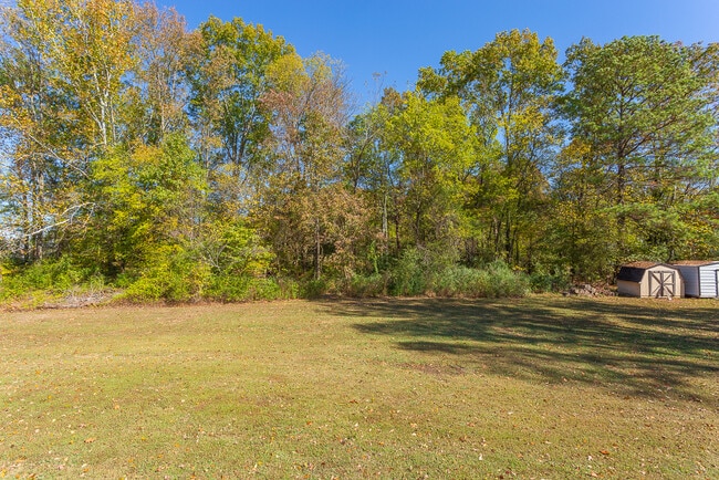 spacious level yard - 9225 Amos Rd