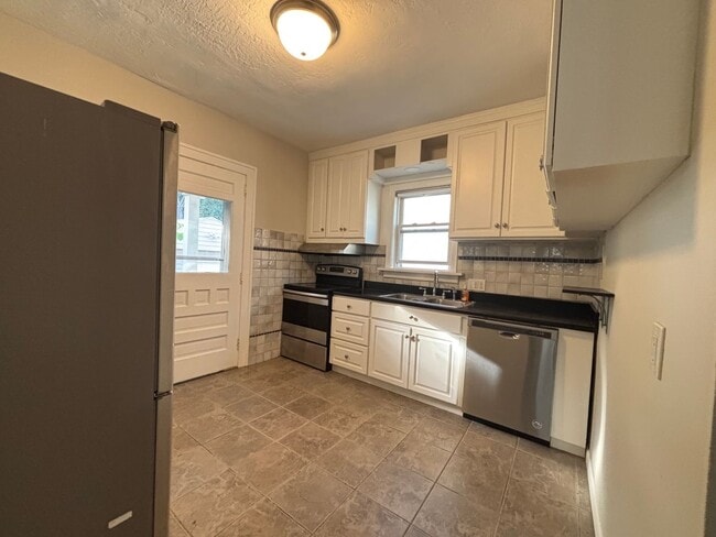 Photo - Charming 3-Bedroom Home in the Heart of Cl...