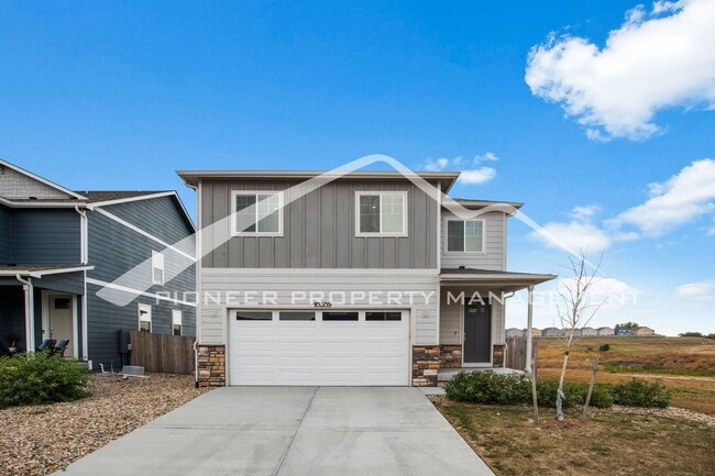 Photo - Modern 4-Bed, 2.5-Bath Home with 2 car garage, AC and Private Enclosed Yard