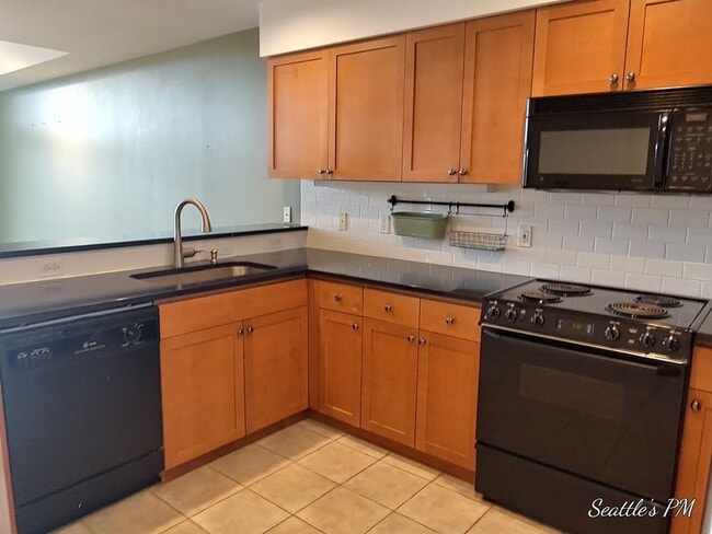 Photo - Top Floor Condo Located in First Hill with 2 Parking Spots Included!!! Unit 504