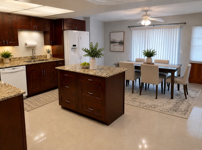 Open kitchen and dining room - 3633 Country Club Blvd Unit 1 - Duplex