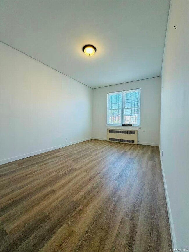 Photo - 60-24 Wetherole St Unit 3rd Fl.