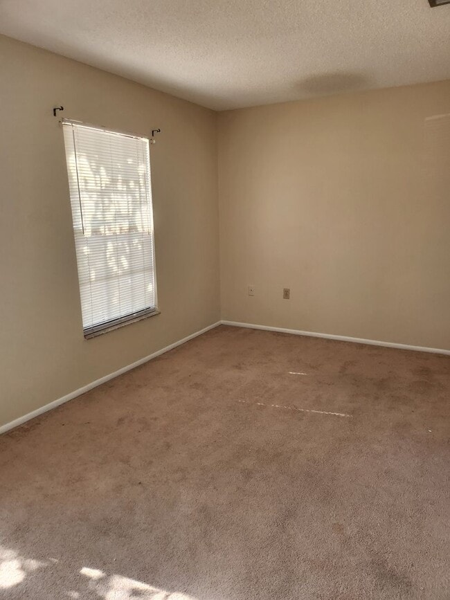 Photo - Cozy and Roomy! Nice corner lot home 2 Bedrooms 2 Baths with 1 car garage and huge backyard. Pets...