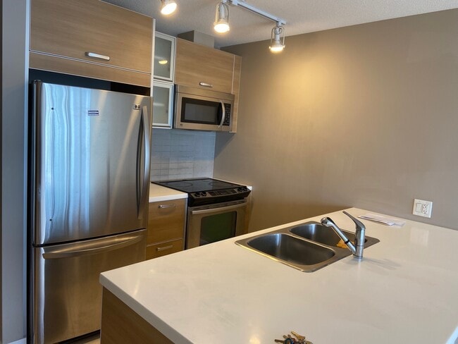9981 Whalley Blvd Unit 3403