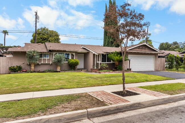 Photo - Charming Updated Home With Drive-Through Garage Access