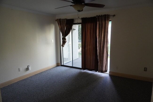 Master bedroom with sliding door to back patio. - 6518 Embarcadero Dr Unit 13