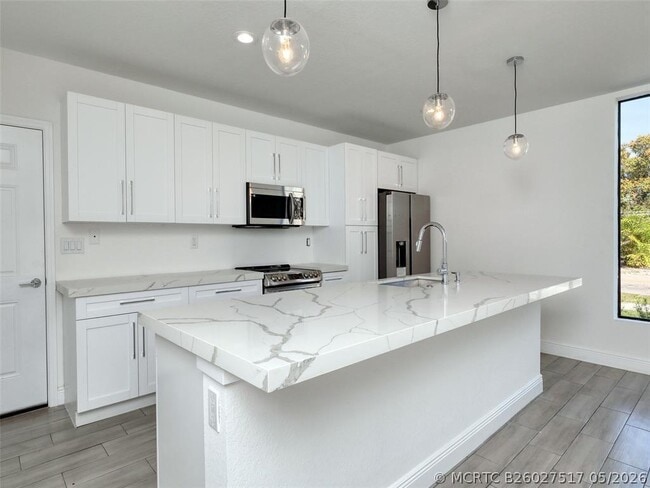 102-116 NW 41st St