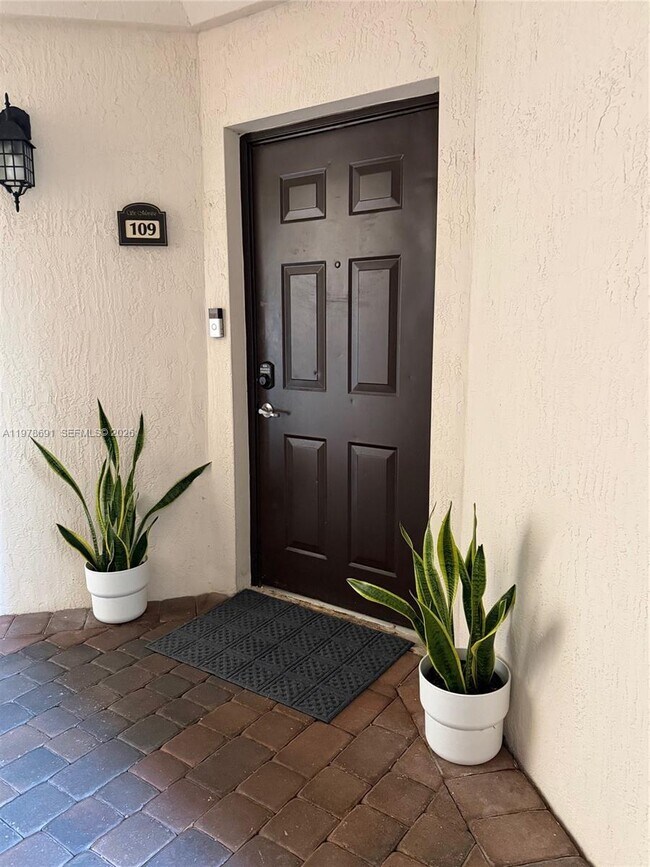 Building Photo - 11603 NW 89th St Unit 109